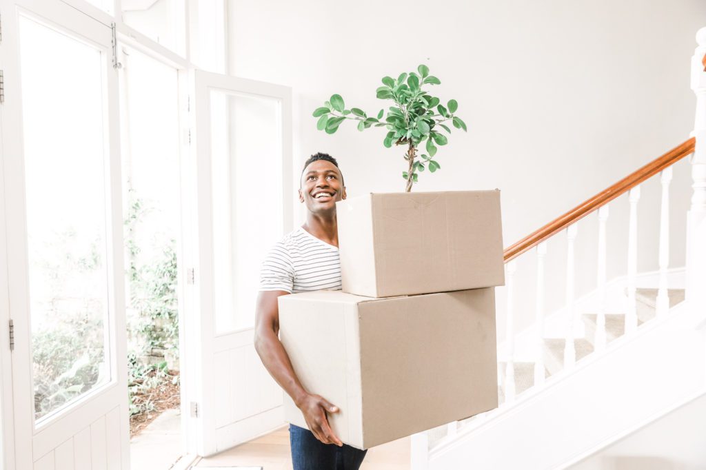 man moving into new home